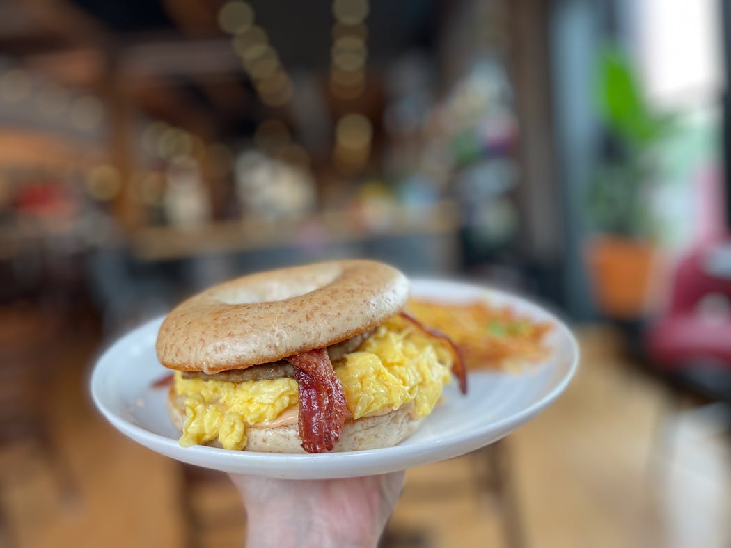 Relish’s ultimate breakfast bagel has everything from a whole wheat bagel (health!) to a creamy and zesty mayo with fluffy scrambled eggs and a side of hash browns.