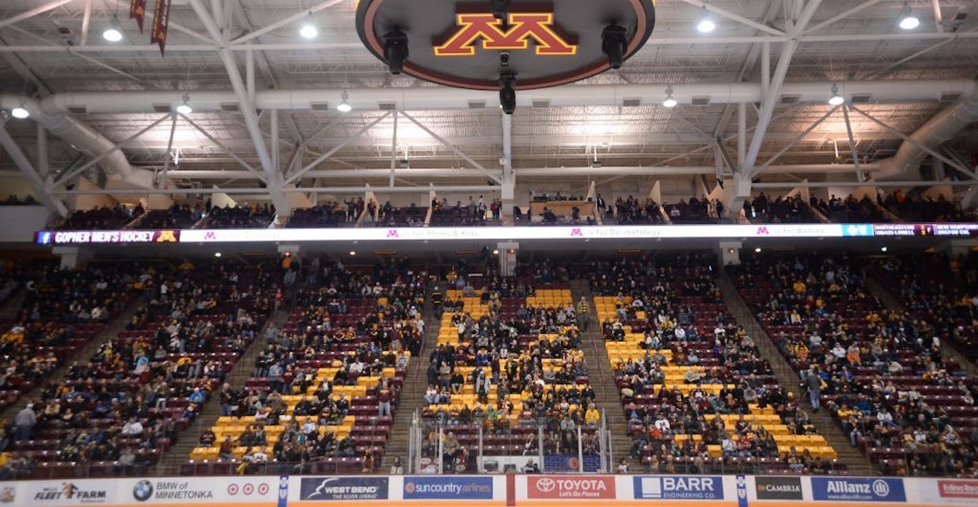 Fans sat in the stands during the third period Friday night during the Gophers men's hockey game against the Penn State Nittany Lions. The announced attendance was 10,053.