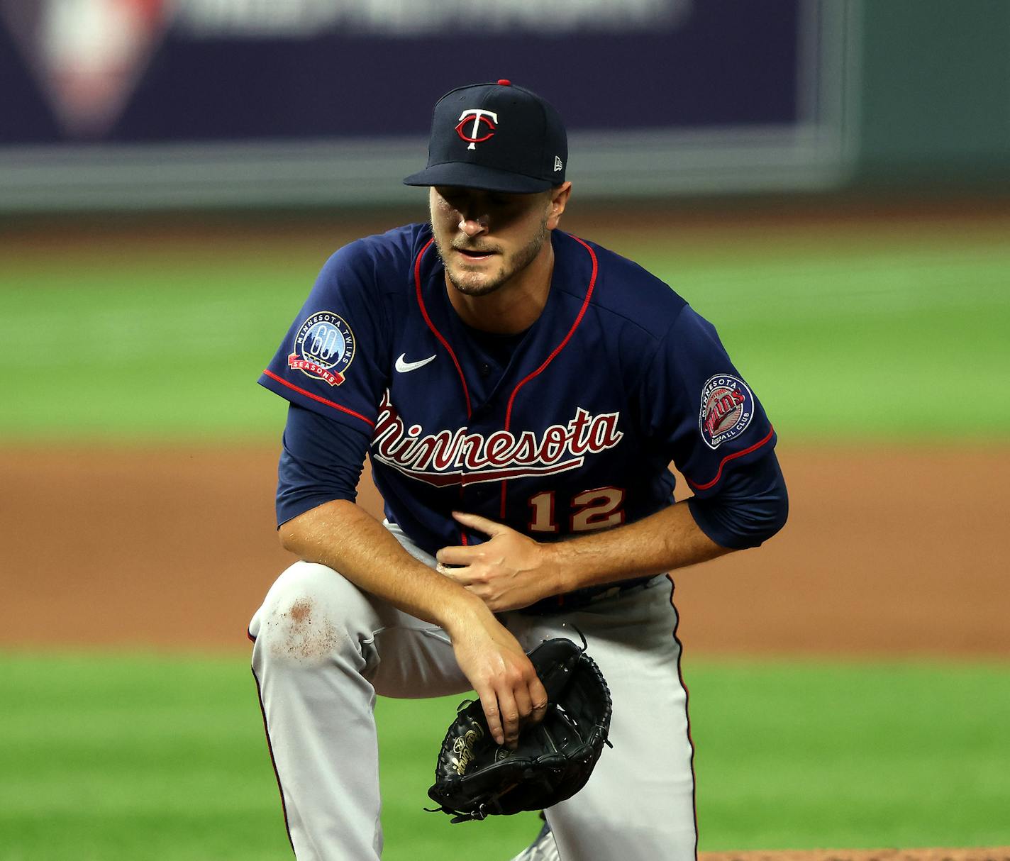 Twins pitcher Jake Odorizzi takes a knee after being hit by the ball during the fourth inning against the Royals at Kauffman Stadium on Friday