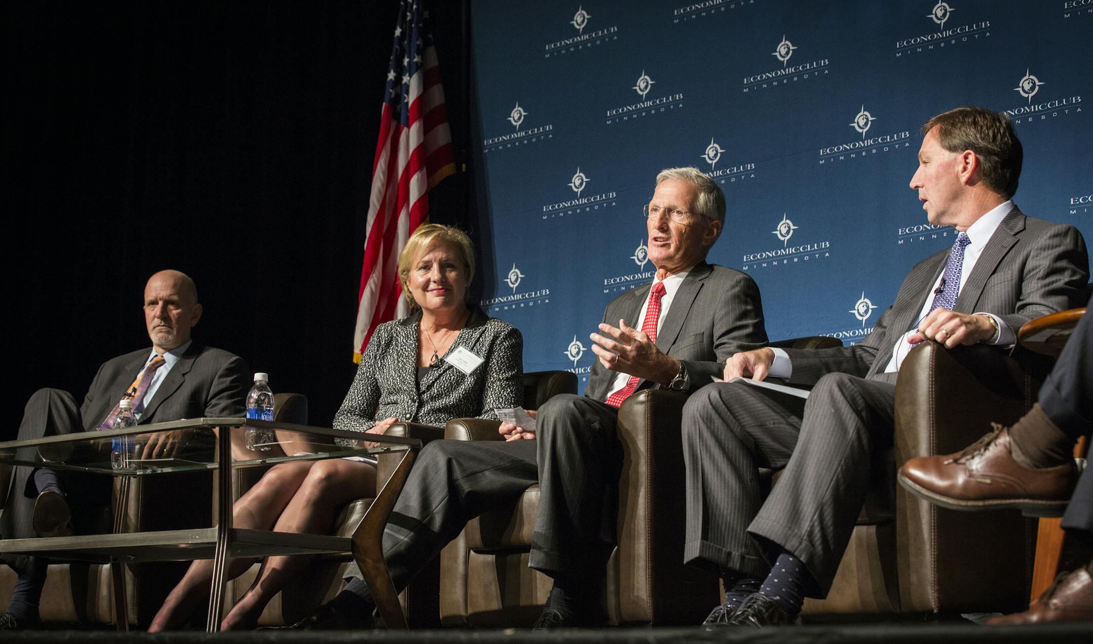 Jeff Harmening, General Mills' Chief Operating Officer, from left, Sally Smith, Buffalo Wild Wings' CEO, Greg Page, Cargill director and the company's former CEO and Jeffrey Ettinger, Hormel's CEO speak on a panel titled the "War on Big Food" during event organized by the Economic Club of Minnesota at the Minneapolis Convention Center on Friday.