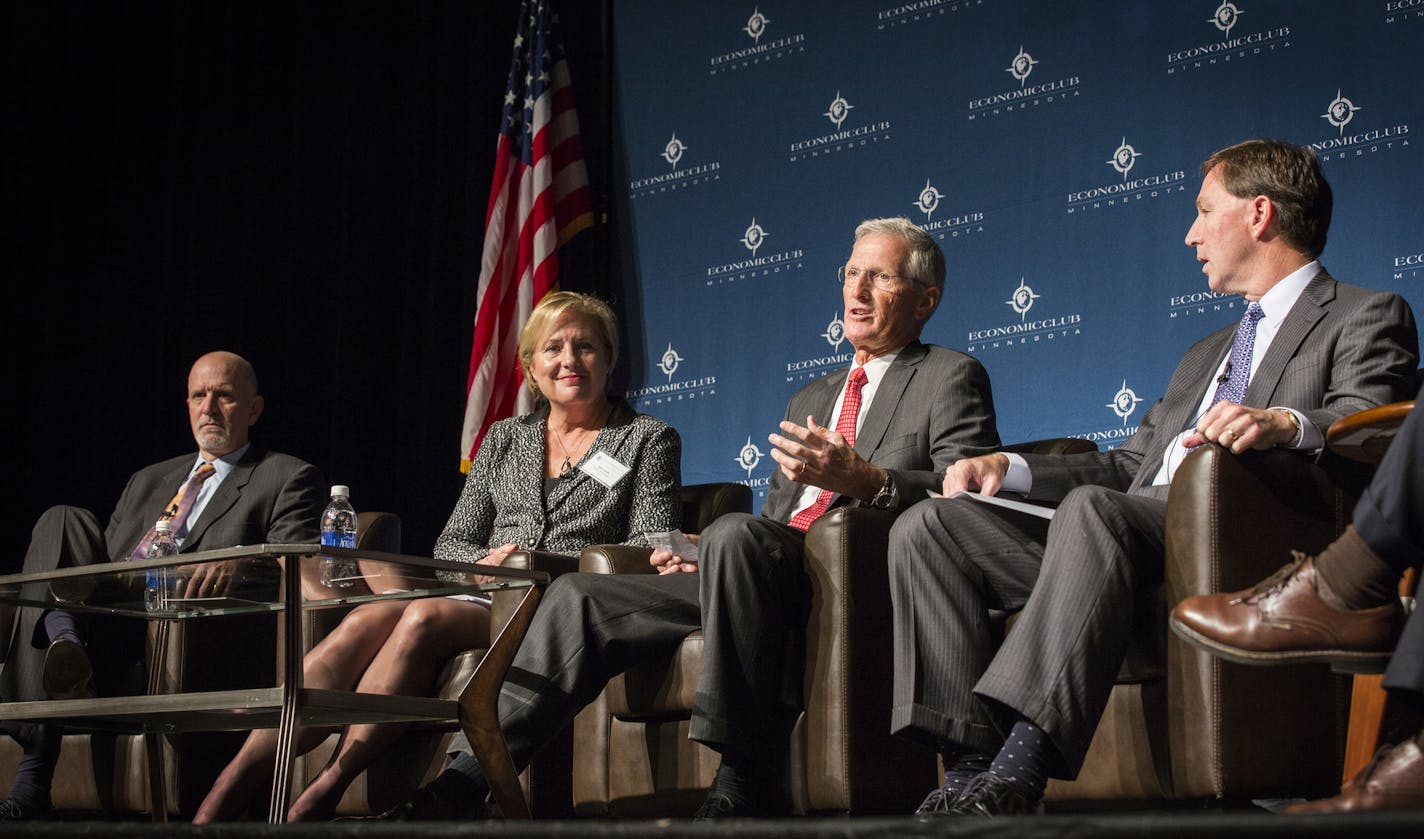 Jeff Harmening, General Mills' Chief Operating Officer, from left, Sally Smith, Buffalo Wild Wings' CEO, Greg Page, Cargill director and the company's former CEO and Jeffrey Ettinger, Hormel's CEO speak on a panel titled the "War on Big Food" during event organized by the Economic Club of Minnesota at the Minneapolis Convention Center on Friday.