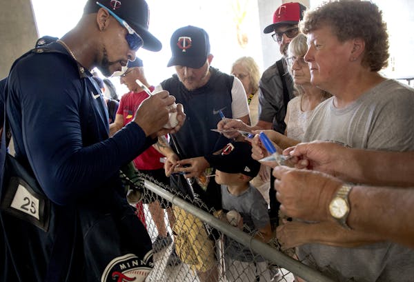 Minnesota Twins outfielder Byron Buxton signed autographs for fans.