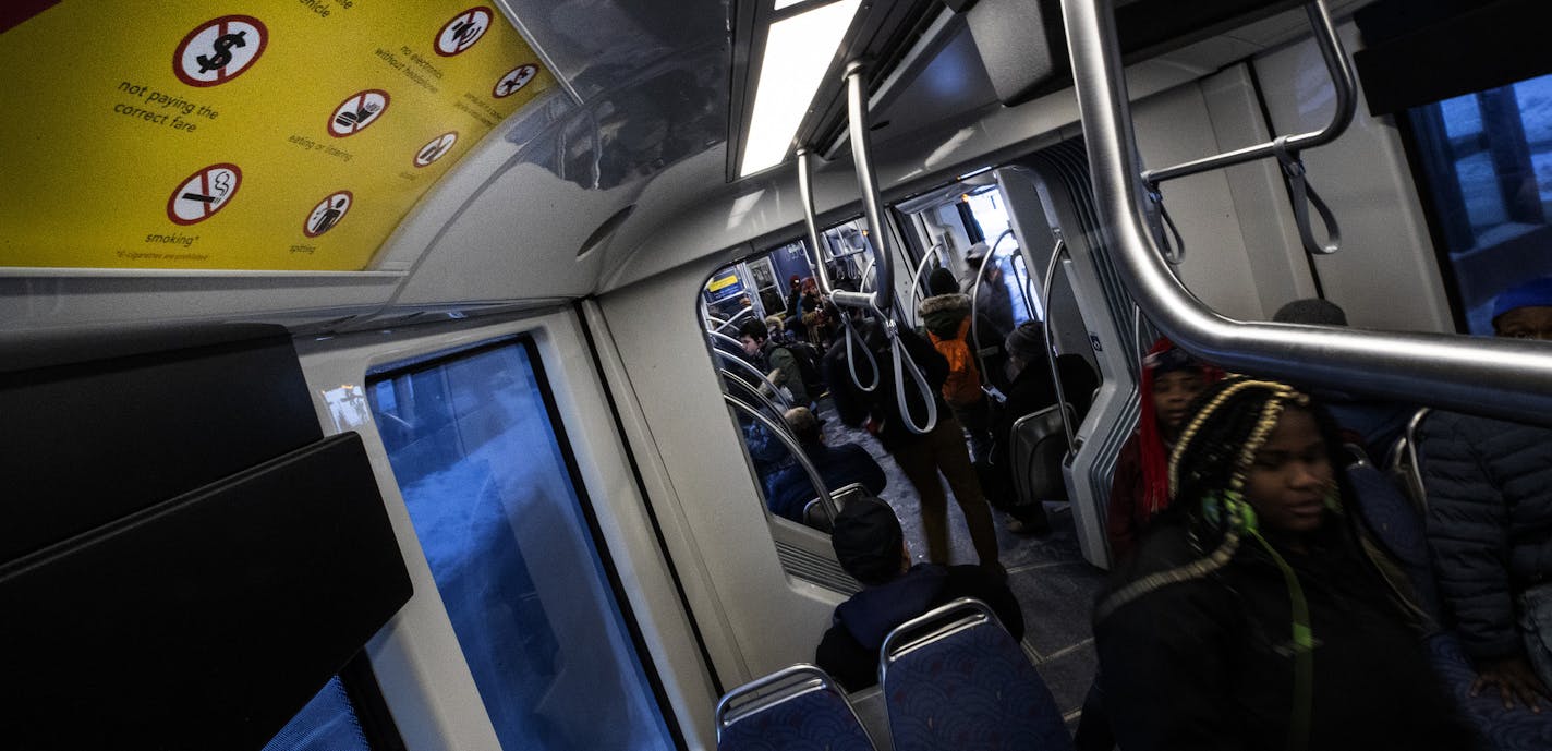 A sign noting illegal things on on the Metro Transit light rail green line train. ] CARLOS GONZALEZ &#x2022; cgonzalez@startribune.com &#x2013; Minneapolis, MN &#x2013; February 26, 2019, In an effort to respond to increasing complaints about passengers smoking on light-rail trains, Metro Transit this week will begin posting plainclothes police officers on both lines who will charge scofflaws with a misdemeanor bearing a fine up to $300.