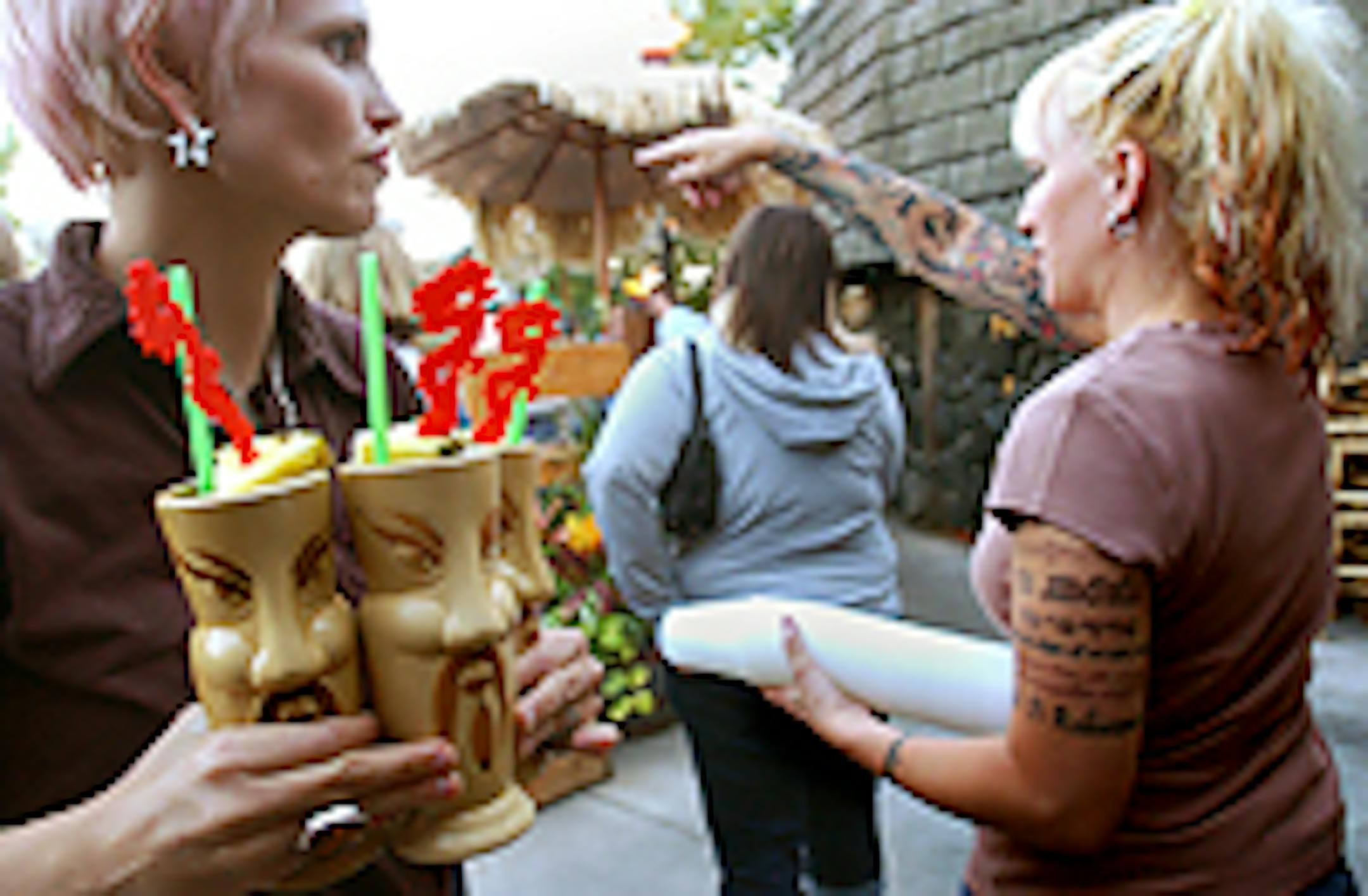 Owner Leslie Bock (right) on Psycho Suzi's patio