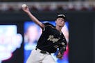 East Ridge pitcher Ryan Thelen threw a complete game in the Class 4A title game against New Prague, allowing two runs on six hits and a walk and strik