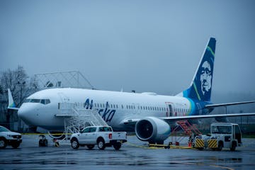 Alaska Airlines N704AL, a Boeing 737 Max 9 plane that lost part of its fuselage midair, parked at Portland International Airport on Jan. 8.