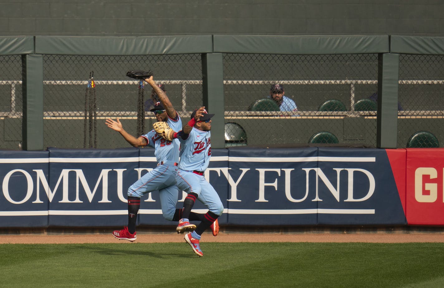 Minnesota Twins left fielder Eddie Rosario's (20) left hand hit teammate Minnesota Twins center fielder Byron Buxton (25) as they were both vying for a seventh ball hit by Cleveland Indians left fielder Josh Naylor (31). ] JEFF WHEELER • jeff.wheeler@startribune.com The Minnesota Twins defeated the Cleveland Indians 7-5 in an MLB baseball game Sunday afternoon, September 13, 2020 at Target Field in Minneapolis.