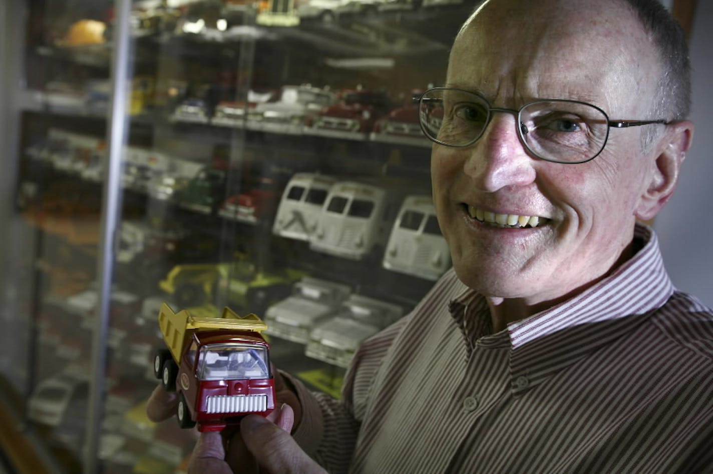 Star Tribune file photo from 2006 of Tonka Toy collector and former Tonka employee Lloyd Laumann at home with his display of more than 400 Tonka toy vehicles.