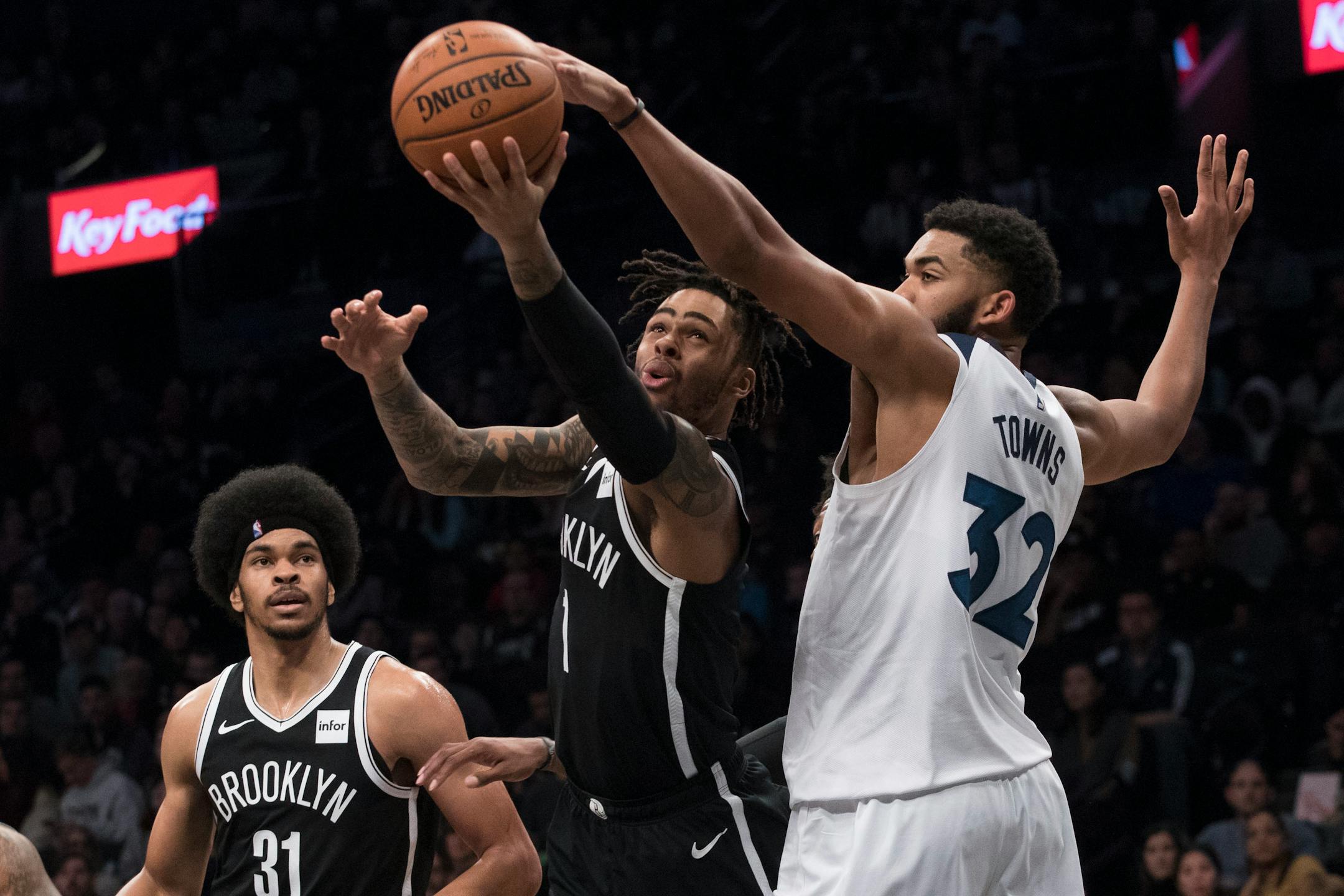 Nets guard D'Angelo Russell (1) was thought to be considering the possibility of joining his friend, center Karl-Anthony Towns (32), on the Wolves as NBA free agency approached, but the allure of playing for Western Conference champion Golden State lured him even further west than Minnesota.