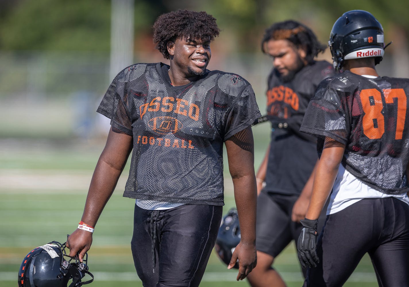 Jerome Williams, the top senior offensive line recruit in Minnesota and a U of M recruit, takes to the field for a morning practice at Osseo High School in Osseo, Minn., on Monday, Aug. 22, 2022. ] Elizabeth Flores • liz.flores@startribune.com