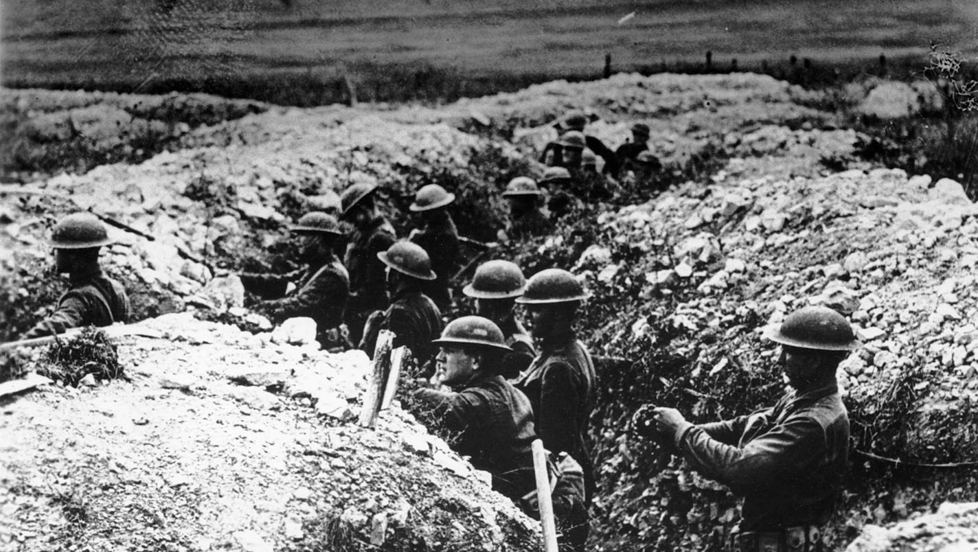 U.S. troops stand in trenches during World War I in France in 1918. (AP Photo) ORG XMIT: APHS130