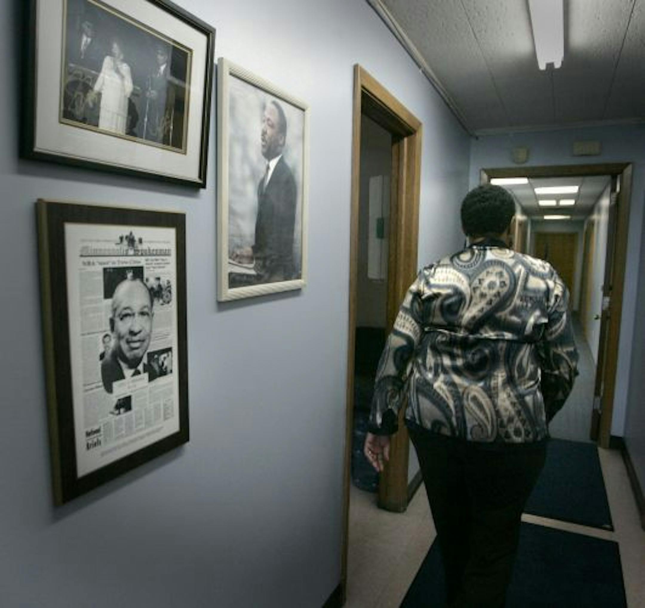 Spokesman-Recorder publisher Tracey Williams walked down a hallway lined with historic photos at the paper's south Minneapolis office.
