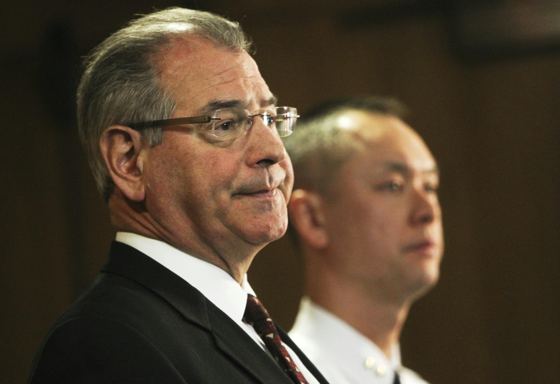 Hennepin County Attorney Mike Freeman and Minneapolis Assistant Police Chief Matt Clark appeared at a press conference at the Hennepin County Government Center Thursday, Dec. 27, 2012, in Minneapolis, MN, in which it was announced that Kao Chongsua Xiong, 31, faces one count of second-degree manslaughter and one count of child endangerment in the Dec. 5 incident in which his son Neegnco Xiong, 2, was accidentally shot by his four-year-old brother with a loaded hand gun belonging to the father.