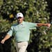 Fred Couples walks off the 11th green after putting out during the third round of the Masters golf tournament Saturday, April 13, 2013, in Augusta, Ga