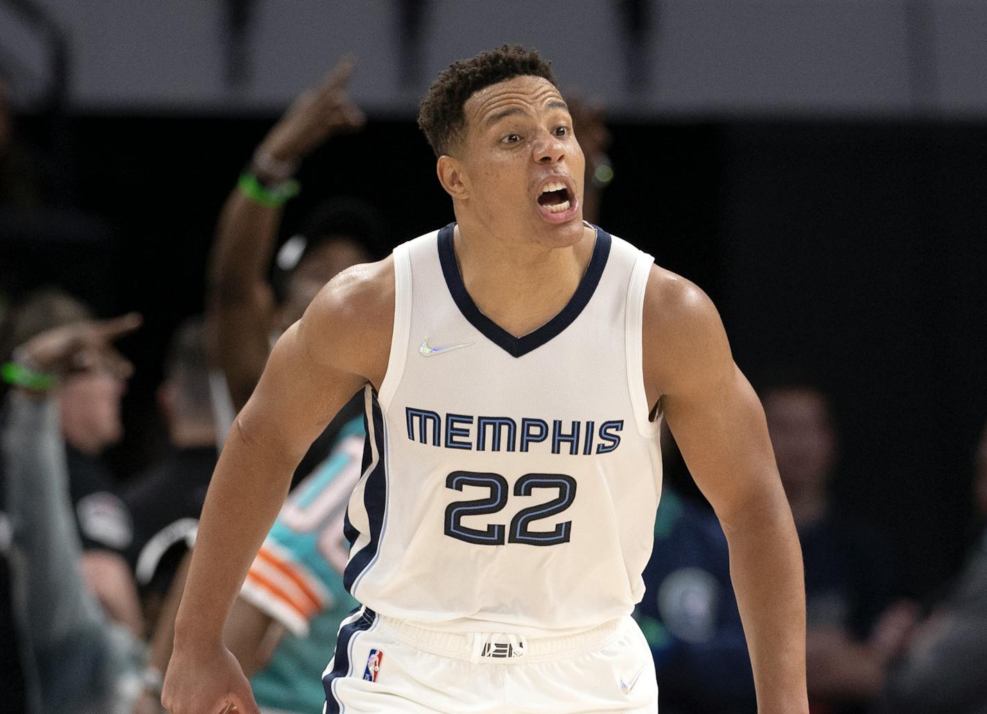 Desmond Bane of the Grizzlies reacts after making a three-pointer in the fourth quarter Thursday during Game 3 vs. the Timberwolves.