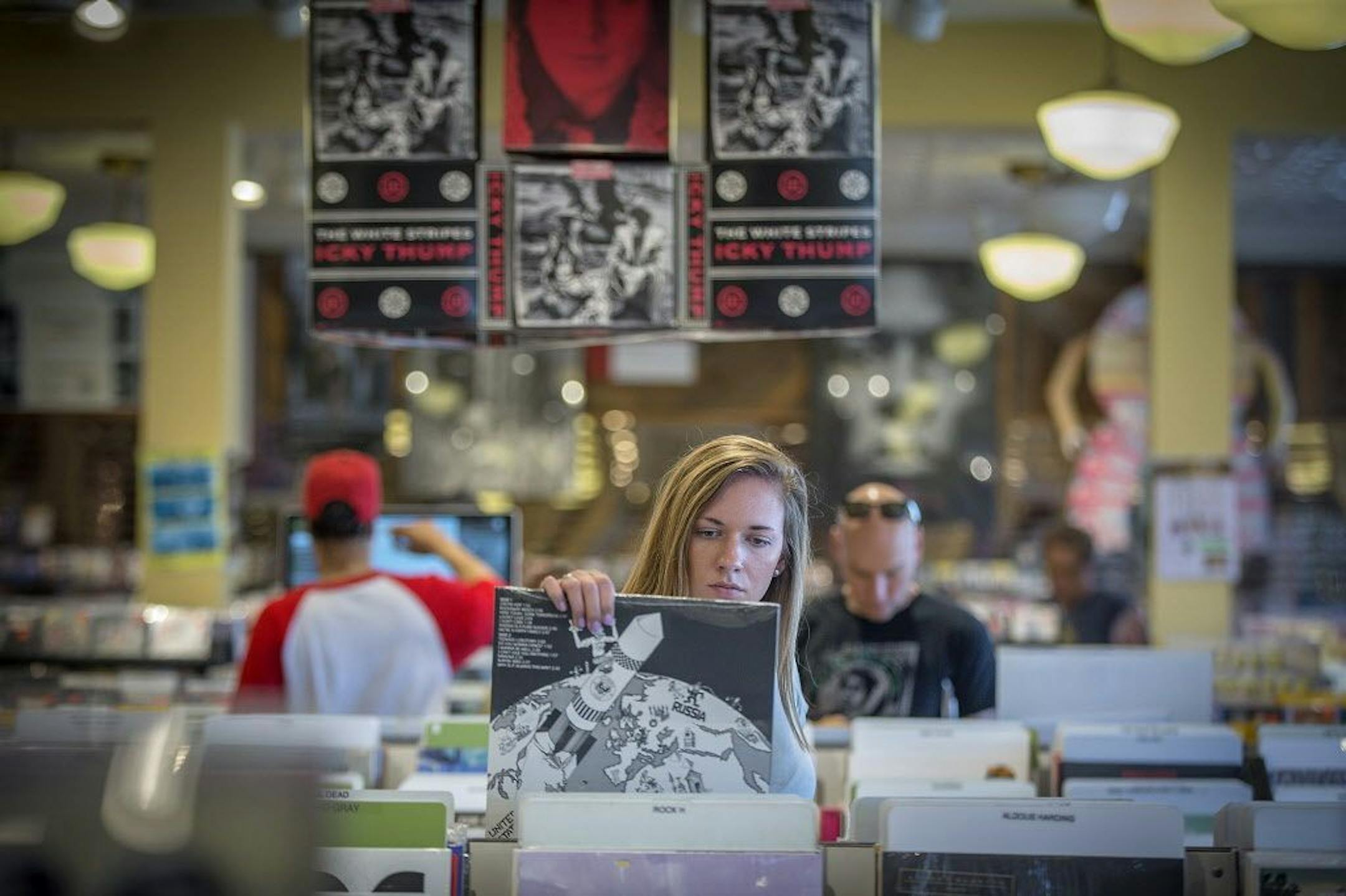 Morgan Tilgner made her way through the vinyl records section at Electric Fetus, Friday, June 1, 2018 in Minneapolis, MN.