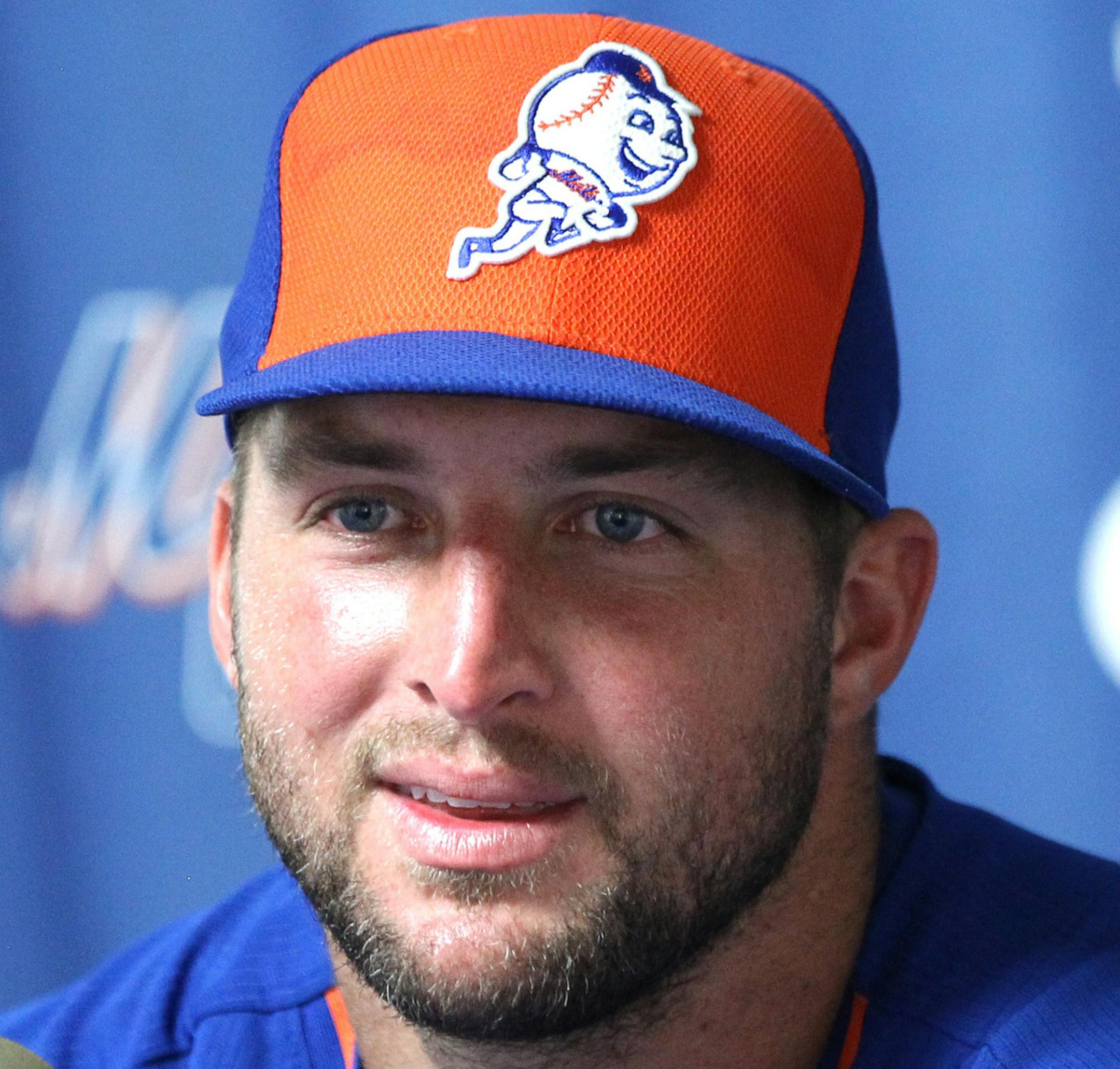 Tim Tebow talks during a press conference after his first instructional league baseball game for the New York Mets against the St. Louis Cardinals instructional club Wednesday, Sept. 28, 2016, in Port St. Lucie, Fla. (AP Photo/Luis M. Alvarez)