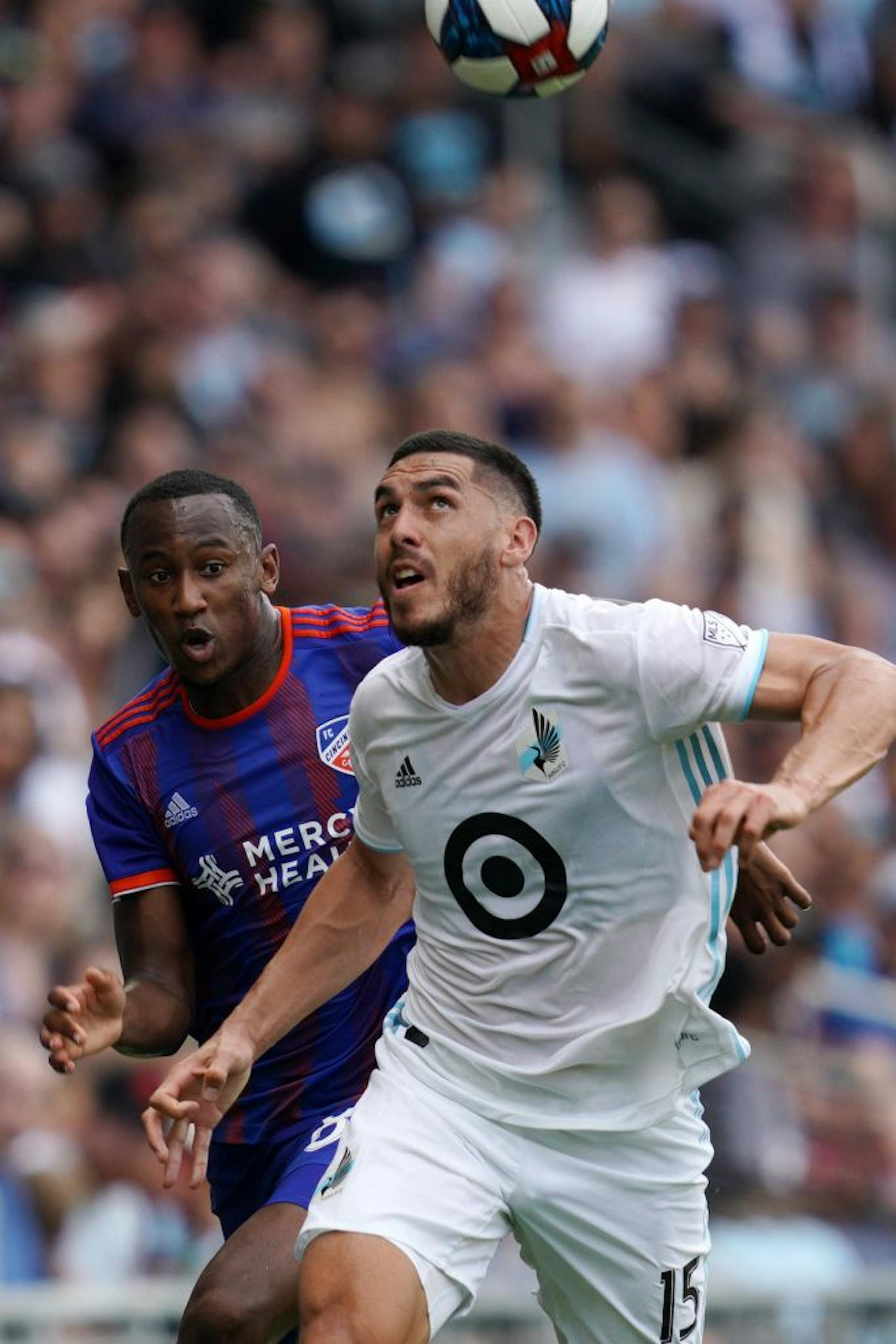 Minnesota United defender Michael Boxall (15) headed the ball down the field in the first half.