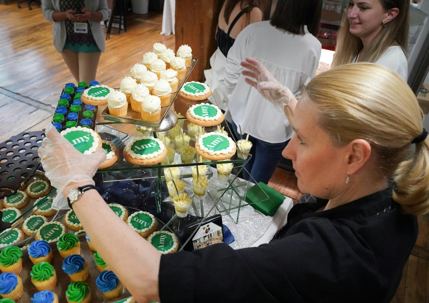 Julie Trautman from Kowalski's catering set out Amy cookies for Thursday night's office opening party at Klobuchar's new Minnesota presidential campaign headquarters. It is in the Banks Building, Suite 125 &#x2014; 615 NE 1st Avenue, Minneapolis. ] GLEN STUBBE &#x2022; glen.stubbe@startribune.com Thursday, May 23, 2019 Klobuchar opens presidential campaign HQ in Mpls.