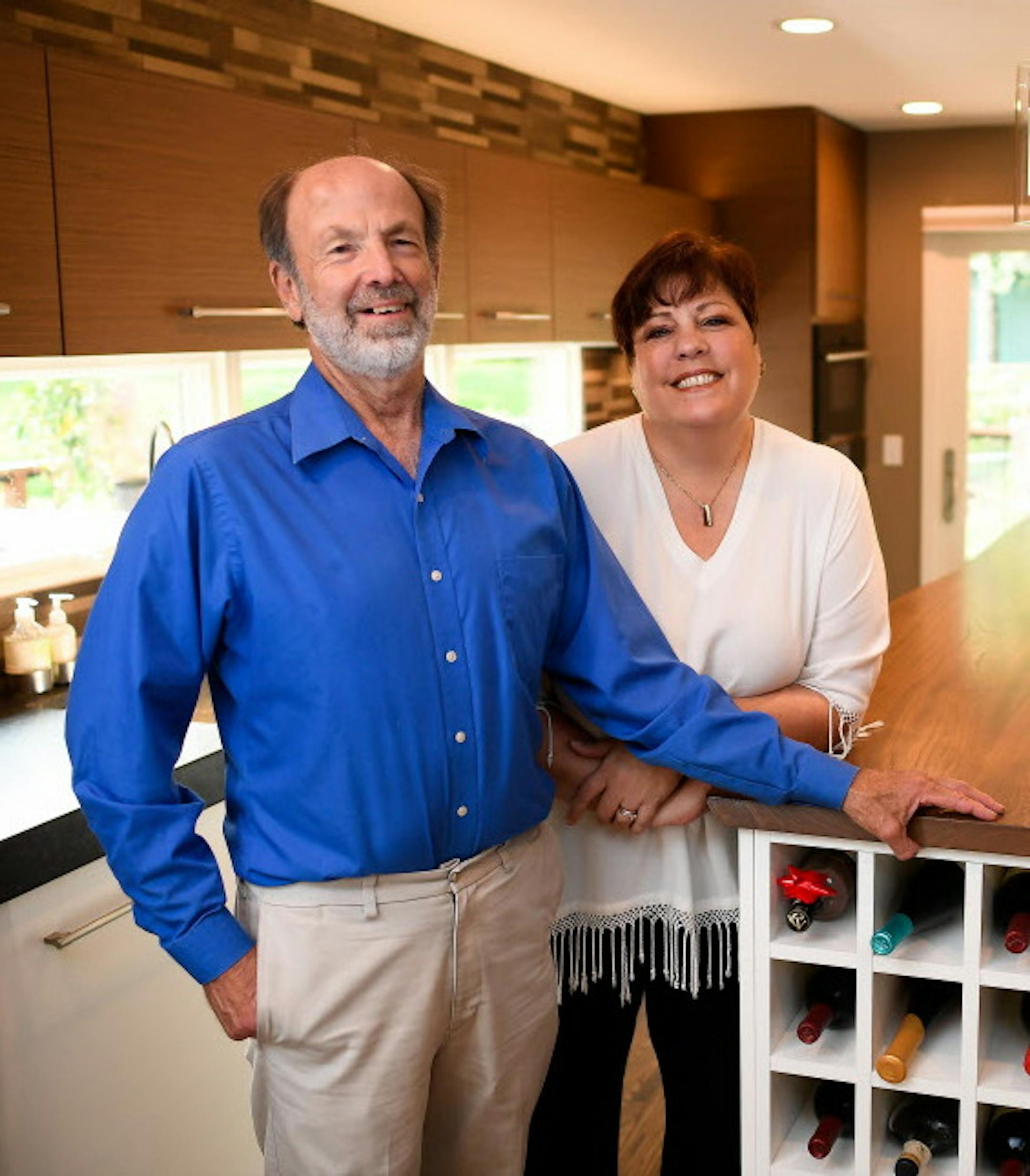 JoLynn Johnson, right, president of Crystal Kitchen + Bath, and her husband, JH Peterson, in their home, which will be open during the Remodelers Showcase.
