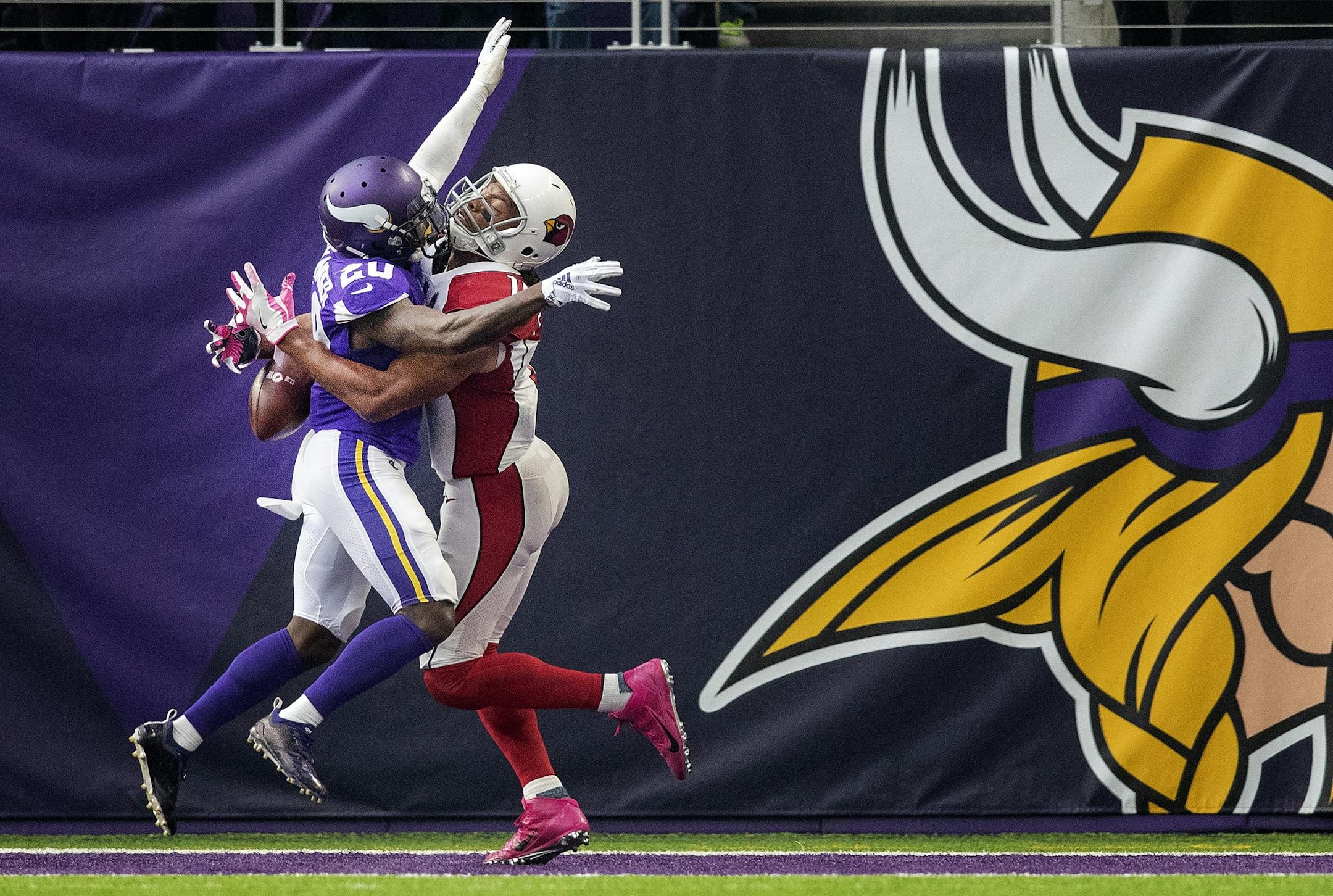 Mackensie Alexander (20) was called for pass interference while covering Larry Fitzgerald in the fourth quarter,