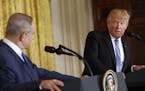 President Donald Trump and Israeli Prime Minister Benjamin Netanyahu participate in a joint news conference in the East Room of the White House in Was