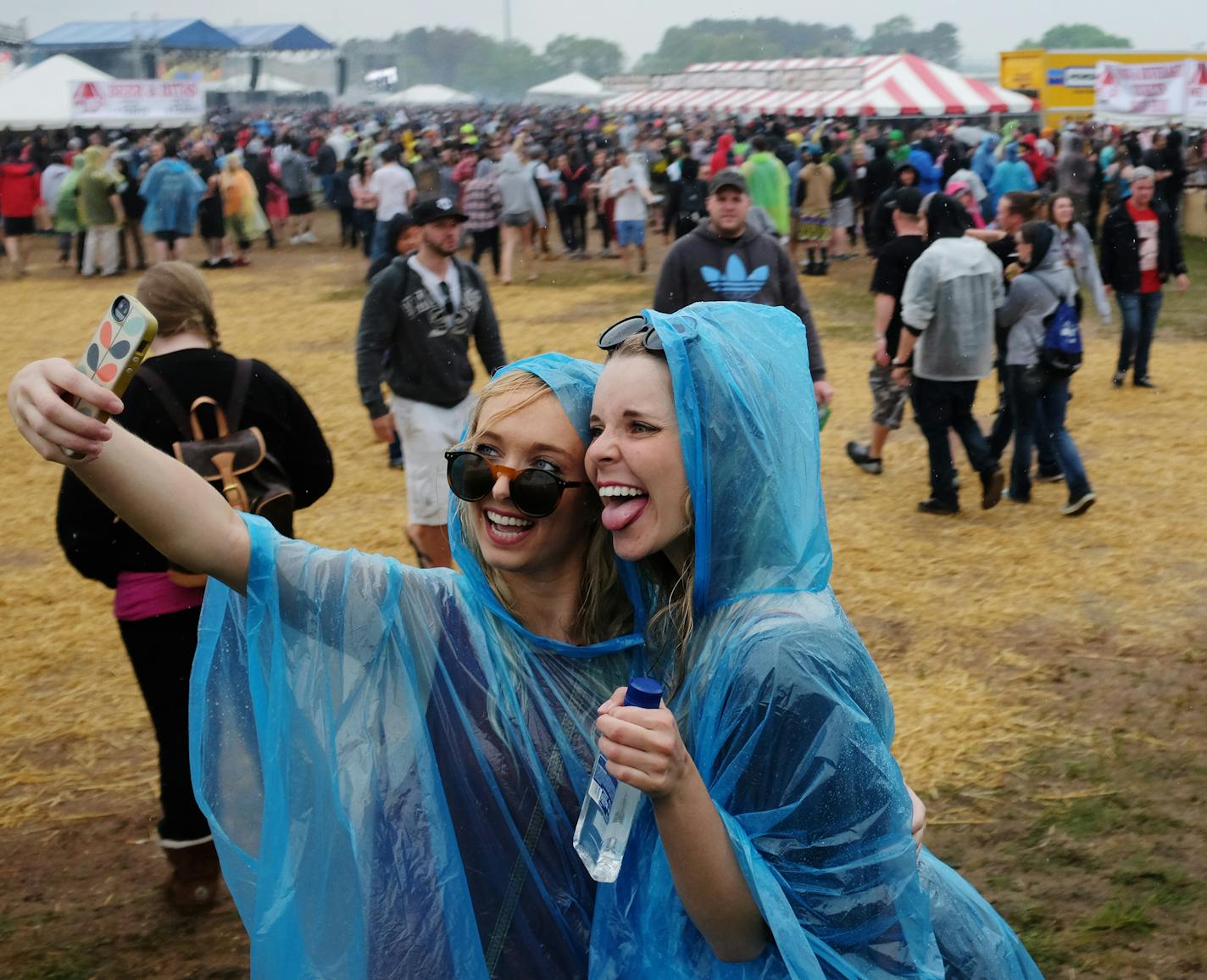 Brook Wise and Mackenzie Walter drove all the way from Sioux Falls, S.D. to attend this year's Soundset festival. ] Mark Vancleave - mark.vancleave@startribune.com * The eighth annual Soundset music festival played out amid rain showers Sunday, May 24, 2015 at Canterbury Park in Shakopee, Minn. ORG XMIT: MIN1505241724440404