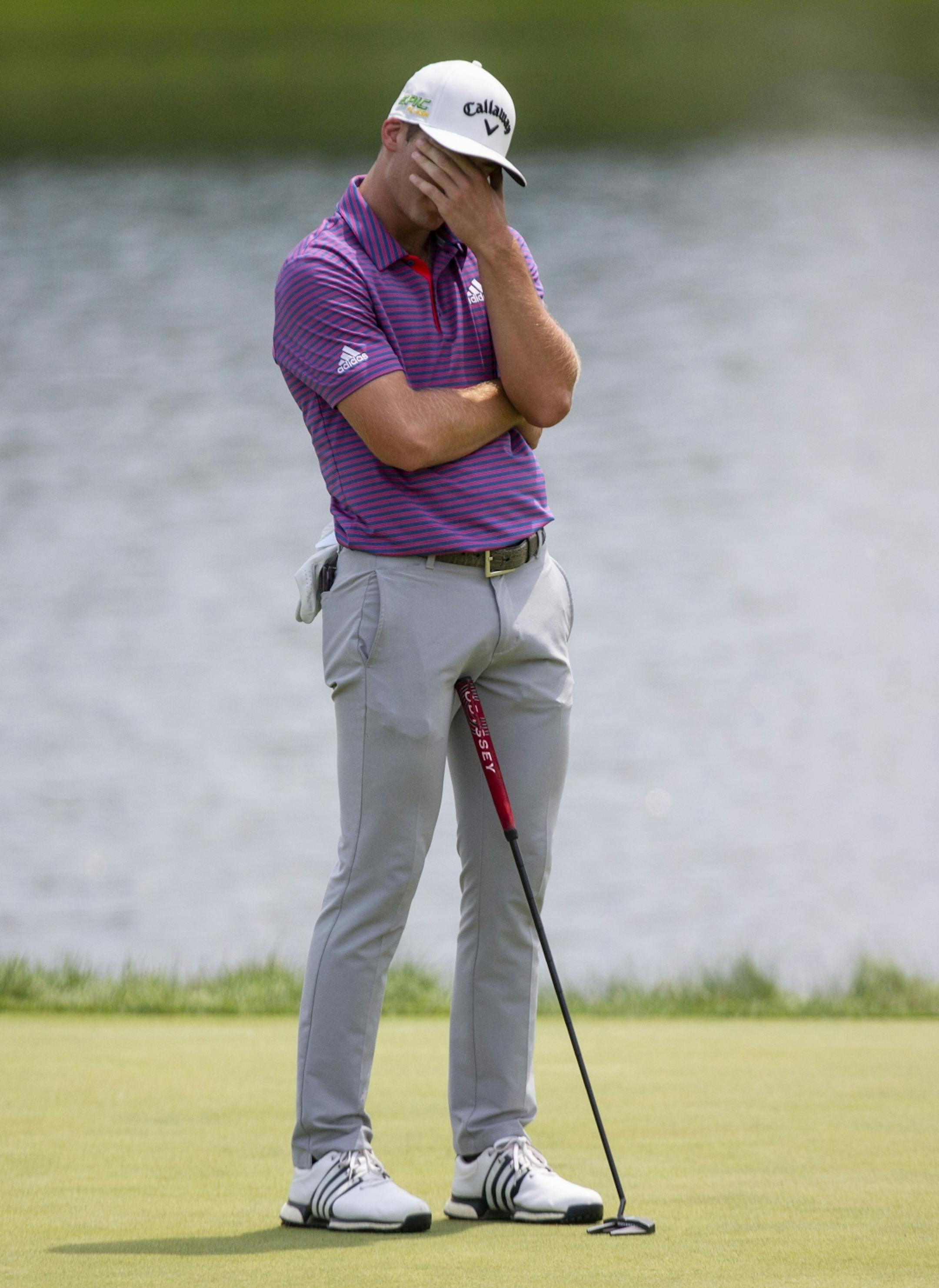 Sam Burns reacts after missing a birdie putt on the 17th hole.