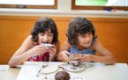 Divya Thammon, 9 and Kiran Thammon, 7, enjoyed ice cream and the chocolate bowls they made.