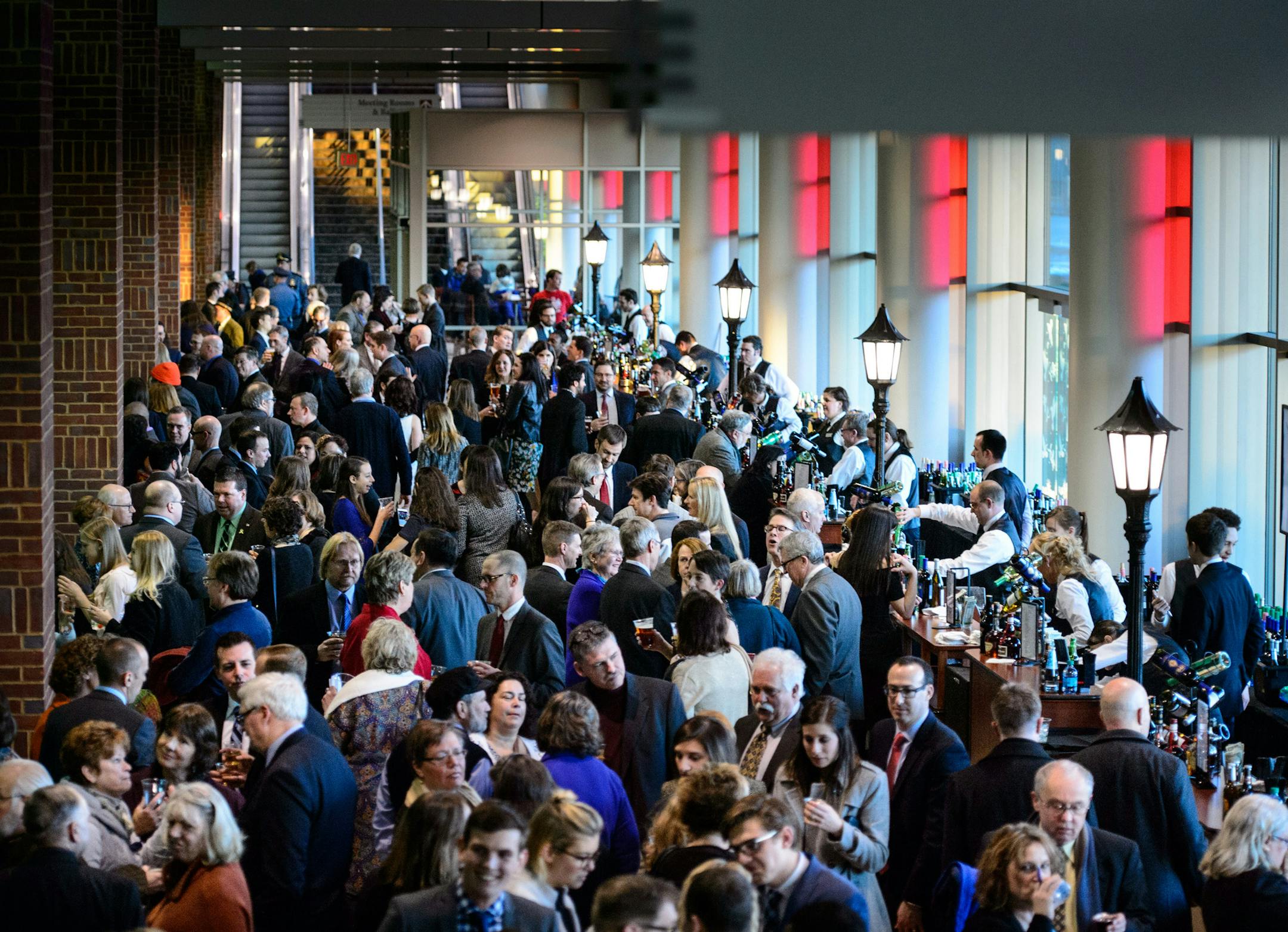 Humphry Mondale Dinner guests drank at the bar before slowly finding their seats at the RiverCentre. ] GLEN STUBBE * gstubbe@startribune.com Friday, February 12, 2016 The Fifth Annual Minnesota DFL Humphrey-Mondale Dinner in the St. Paul RiverCentre.