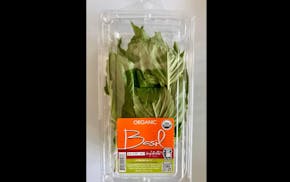 Trader Joe's has recalled a packaged basil product that officials say is linked to a salmonella outbreak.