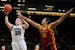 Iowa forward Monika Czinano (25) drives to the basket past Iowa State center Stephanie Soares (10) during the second half of an NCAA college basketbal