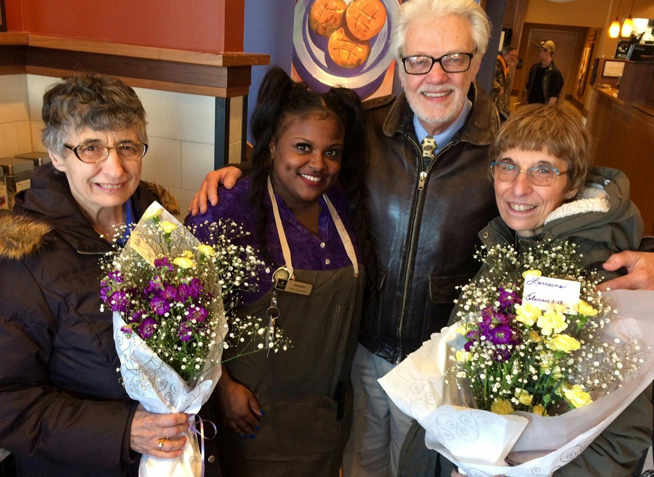 Kathleen Rys (from left), Jacquinta Adams, Bruce Smit and Lorraine O'Kelly pause for a photo following a meeting during which Smit apologized to Rys and O'Kelly for being a bully in grammar school. (Tammy Smit/Daily Southtown/TNS)