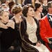 The Crawleys support the men in uniform. Shown from L-R: Dame Maggie Smith as the Dowager Countess, Elizabeth McGovern as Lady Cora, Hugh Bonneville a