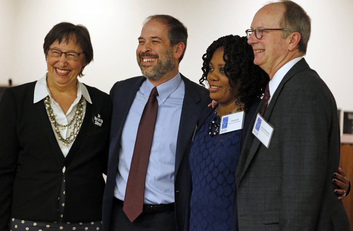 Left to right---Mary Vanderwert, Steve Marchese, Zuki Ellis, and Jon Schumacher, candidates who ran under a Caucus for Change banner critical of district leadership are sworn in as a new St. Paul School Board majority.] Richard Tsong-Taatarii/rtsong-taatarii@startribune.com