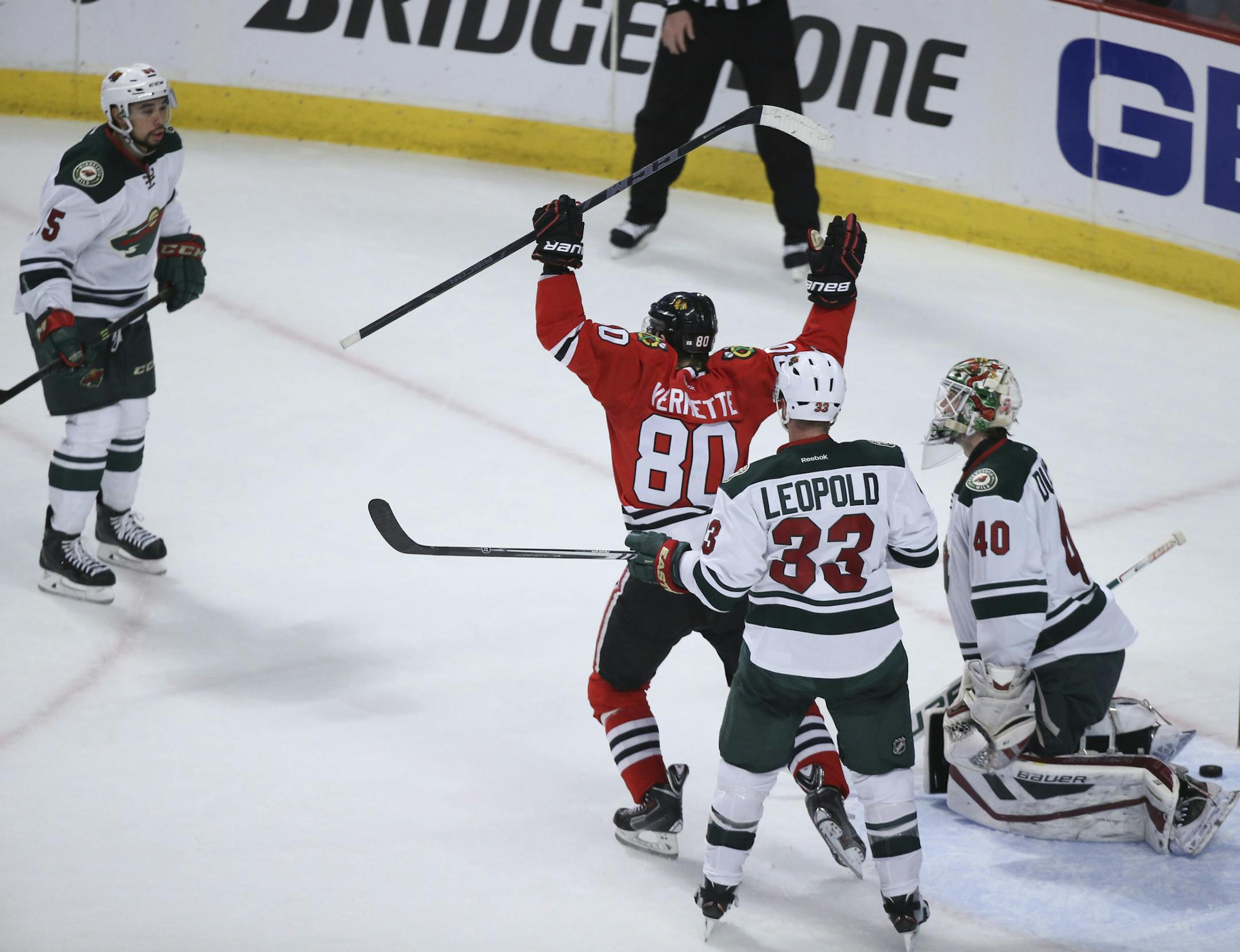 The Chicago Blackhawks' Antoine Vermette (80) celebrates what proved to be the game-winning goal by teammate Teuvo Teravainen, not pictured, in the second period against the Minnesota Wild in Game 1 of the second round of the NHL playoffs at United Center in Chicago on Friday, May 1, 2015. The Blackhawks won, 4-3. (Jeff Wheeler/Minneapolis Star Tribune/TNS)