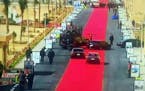 In this Saturday, Feb. 6, 2016 image taken from Egypt State TV, Egyptian President Abdel-Fattah el-Sissi's motorcade drives on a red carpet during a t