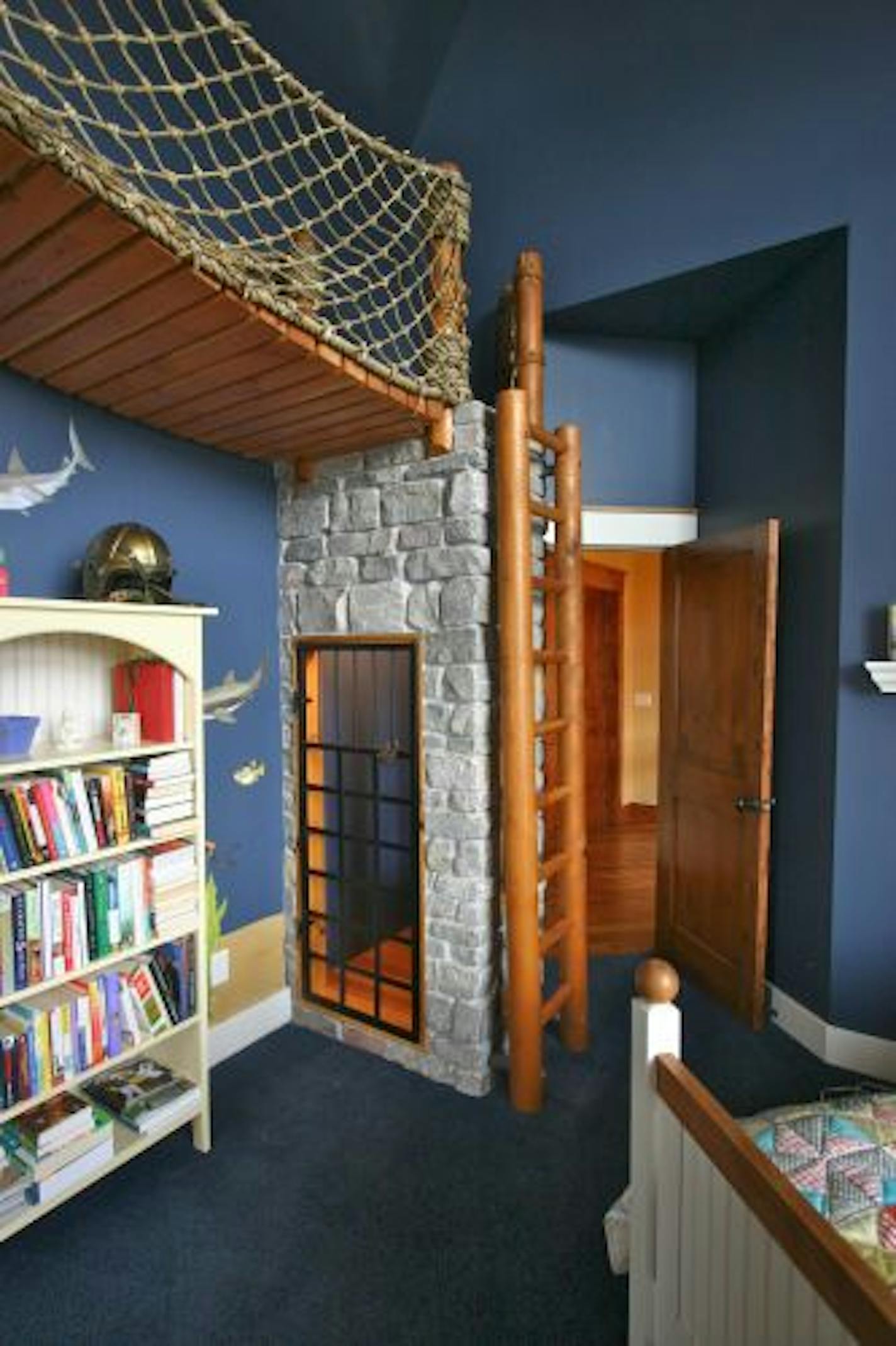 The pirate-themed bedroom includes a jail cell for "evil-doers."