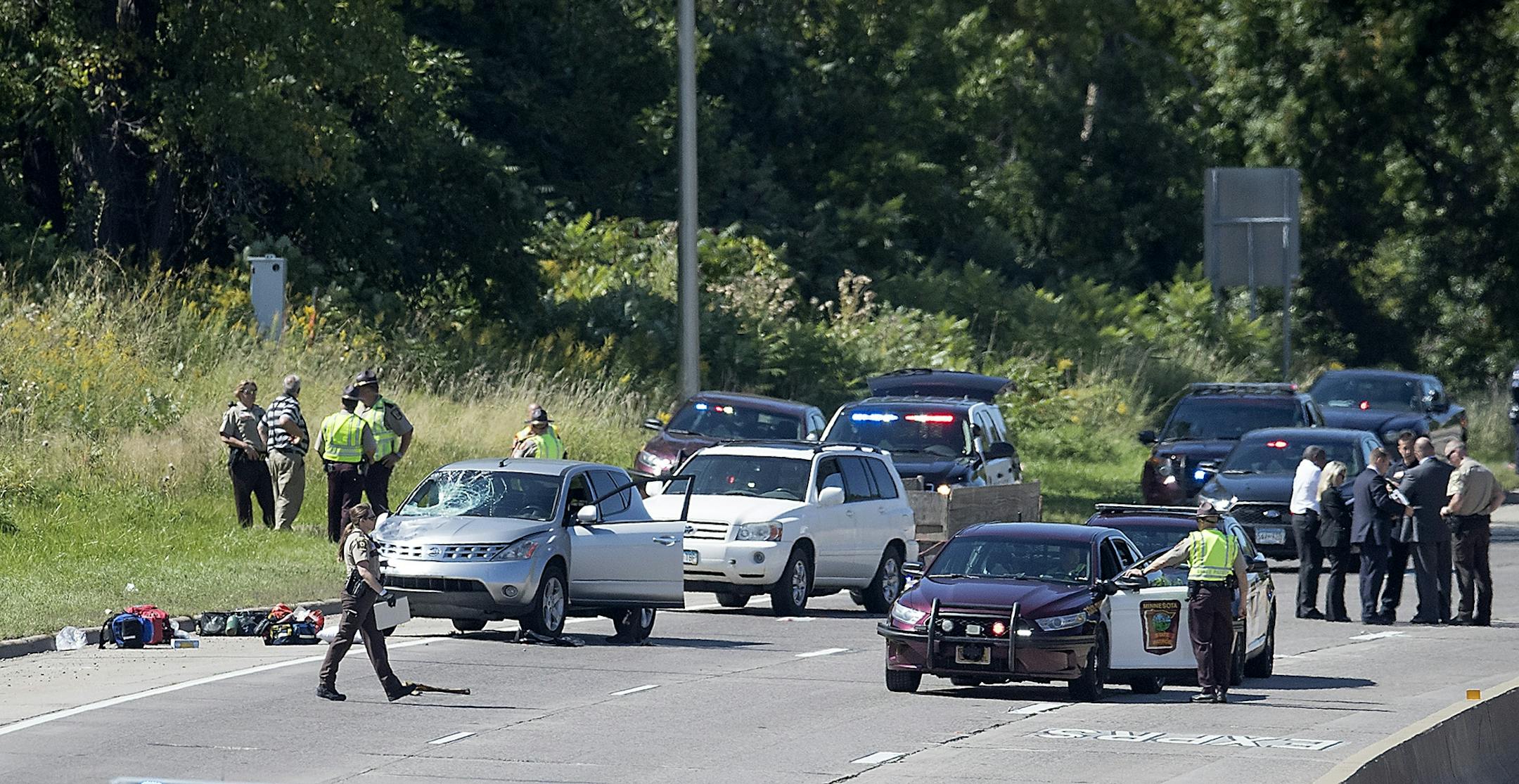 Law enforcement worked the scene of an officer-involved accident on HWY 12, Friday, September 8, 2017 in Wayzata, MN.