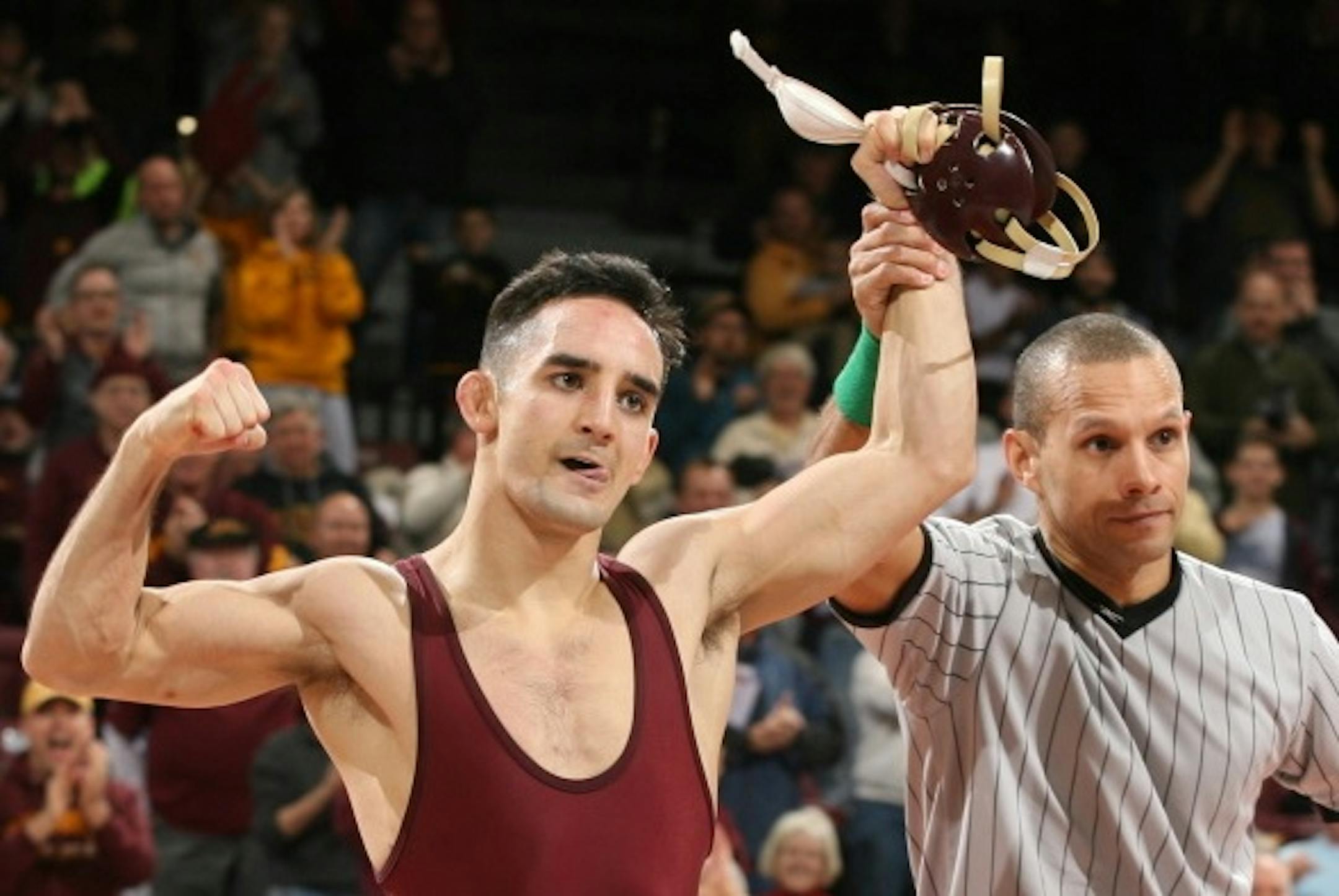 The Gophers' Ben Morgan picked up a pin at 133 pounds in his career debut, a key victory in Minnesota's 23-18 comeback victory over Purdue on Sunday.