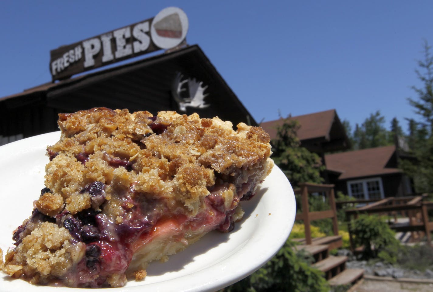 The 3berry cob pie at the the Rustic Inn Caf&#x221a;&#xa9; 2773 Hwy. 61, Two Harbors, 218-834-2488. It&#x201a;&#xc4;&#xf4;s located about 10 miles up the shore from Two Harbors The &#x201a;&#xc4;&#xfa;Pies&#x201a;&#xc4;&#xf9; sign on the roof of the very charming looking building.__Food writer Rick Nelson makes his annual trip to parts of Minnesota we might want to go. This year it&#x201a;&#xc4;&#xf4;s the North Shore, From Duluth to past Grand Maria, which brought us a good mix of people, setti