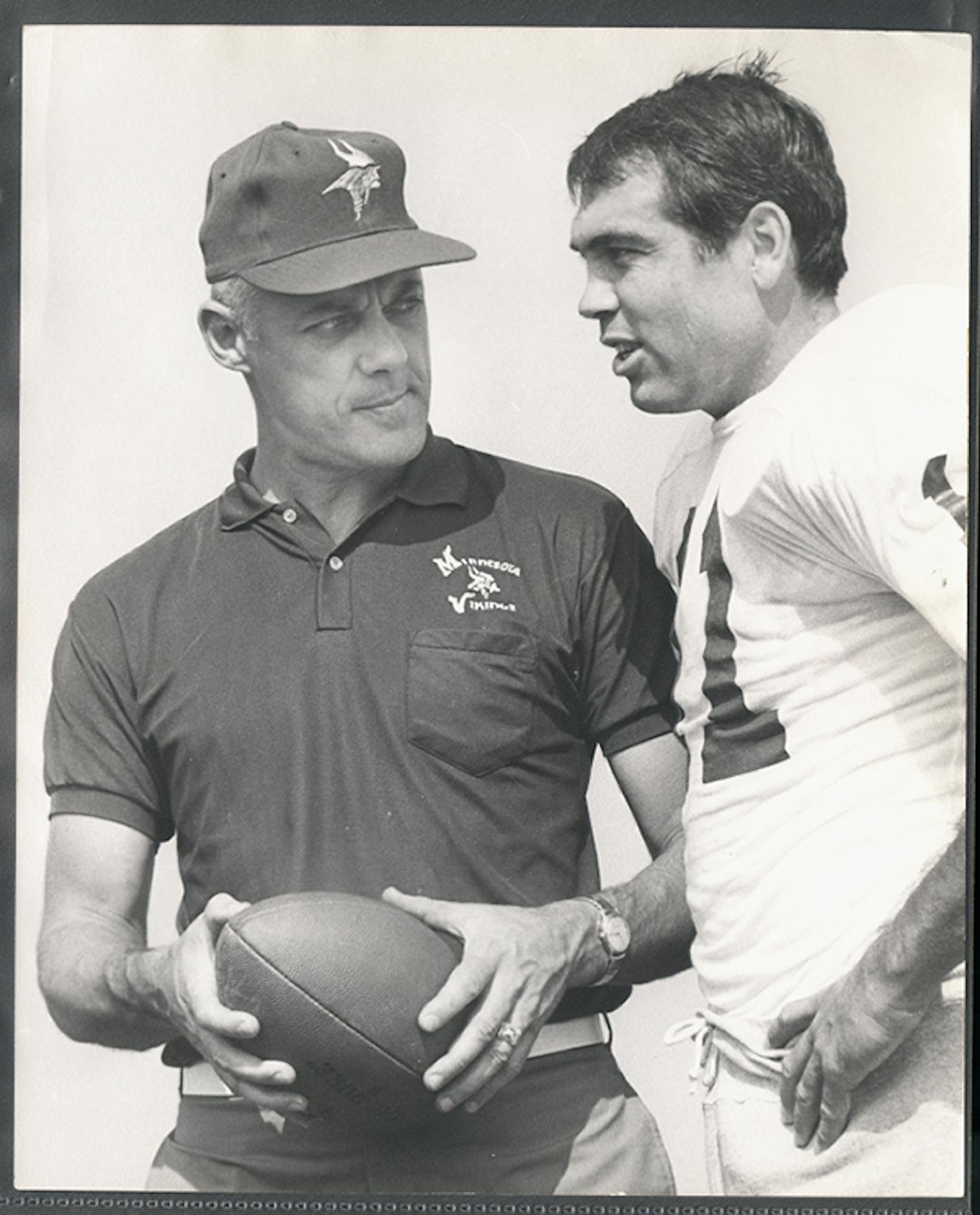 CHARLES BJORGEN/ STAR TRIBUNE file photo ... New Coach Bud Grant confers with new quarterback Joe Kapp during training camp prior ot the 1967 season. Despite a 3-8-3 finish that season, Grant and Kapp were Super-Bowl bound by the end of the decade.