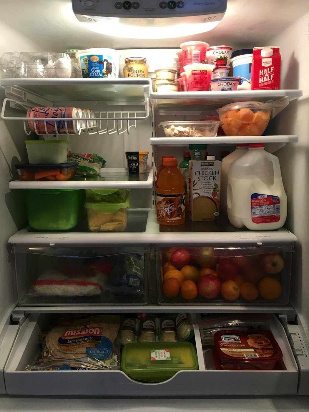A well-organized fridge should keep items that are about to expire up front and eye level, says chef and professional organizer Joor Erin. She also makes sure fruits and veggies are highly visible for her kids.