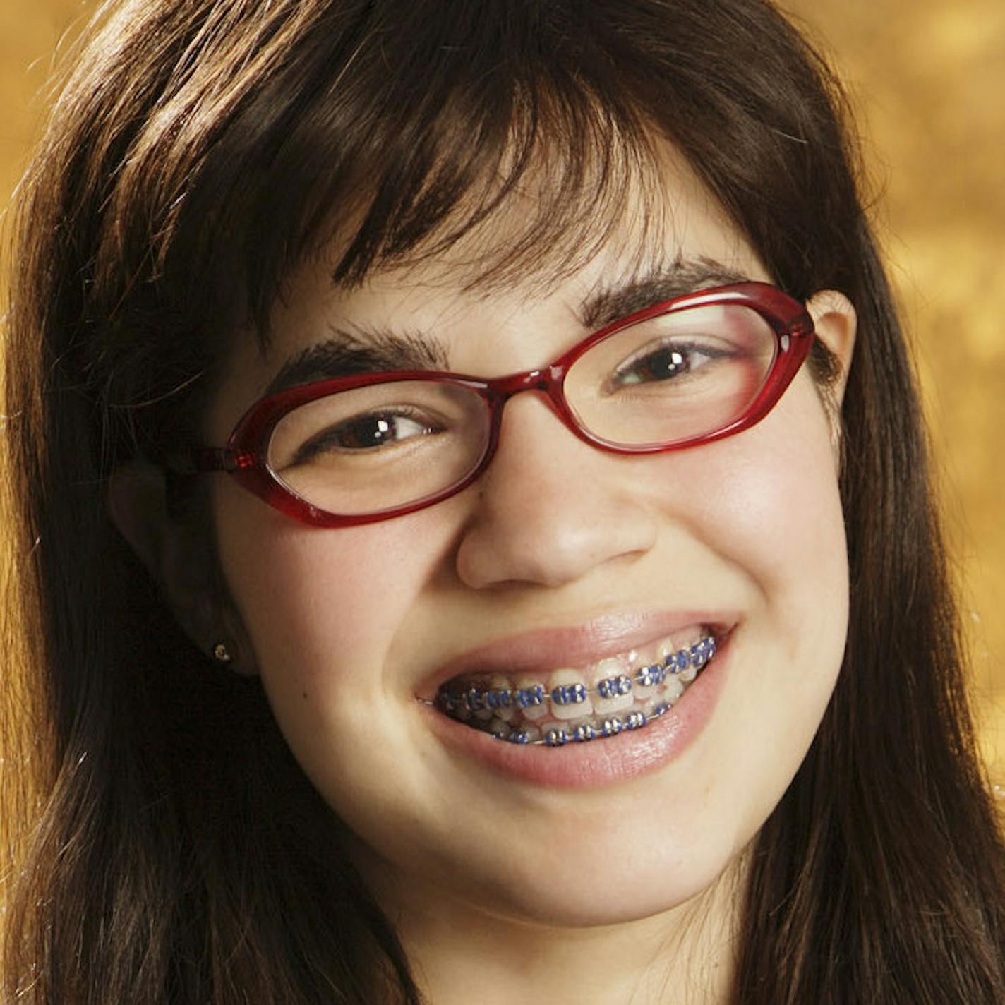 This undated promotional photo, provided by ABC, shows actress America Ferrera as Betty Suarez in the new ABC series "Ugly Betty." "It takes me an hour to become Betty. But I love that she's so different from me," Ferrara, 22, tells TV Guide in its Dec. 18-24 issue. "I can (keep) a bit of myself private." (AP Photo/ABC, Eric Liebowitz) ORG XMIT: NYET163