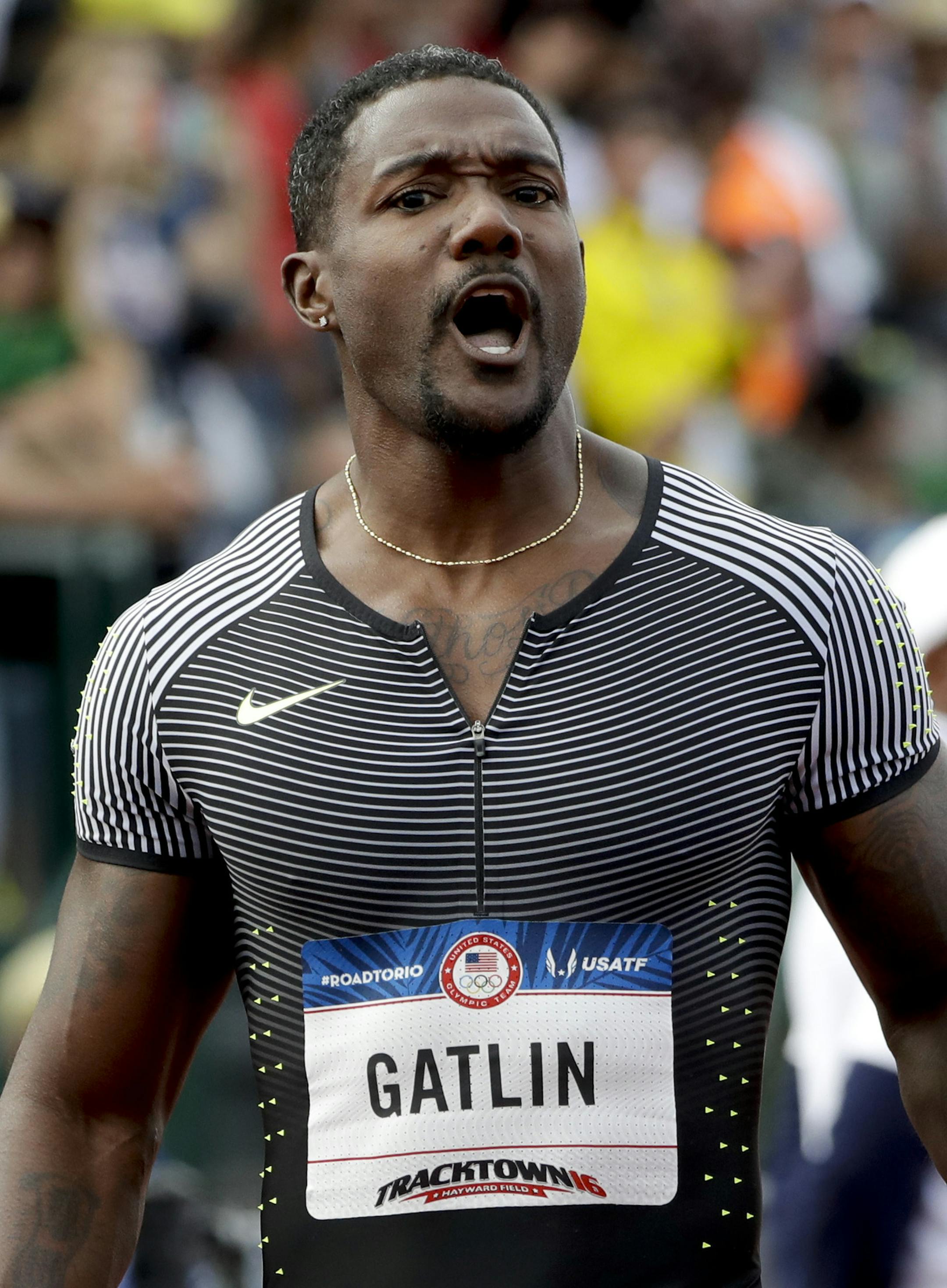 FILE - In this Saturday, July 9, 2016, file photo, Justin Gatlin celebrates his win in the men's 200-meter run at the U.S. Olympic Track and Field Trials in Eugene, Ore. Gatlin Told The Associated Press he's not paying attention to what people are saying about his past doping violations, and he's not concerned with those who think he doesn't belong at the Rio Games. (AP Photo/Marcio Jose Sanchez, File)
