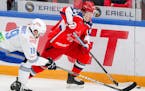 HC Barys Nur-Sultan's Corban Knight, left, and HC CSKA Moscow's Kirill Kaprizov in their 2019/20 Kontinental Hockey League regular season ice hockey m