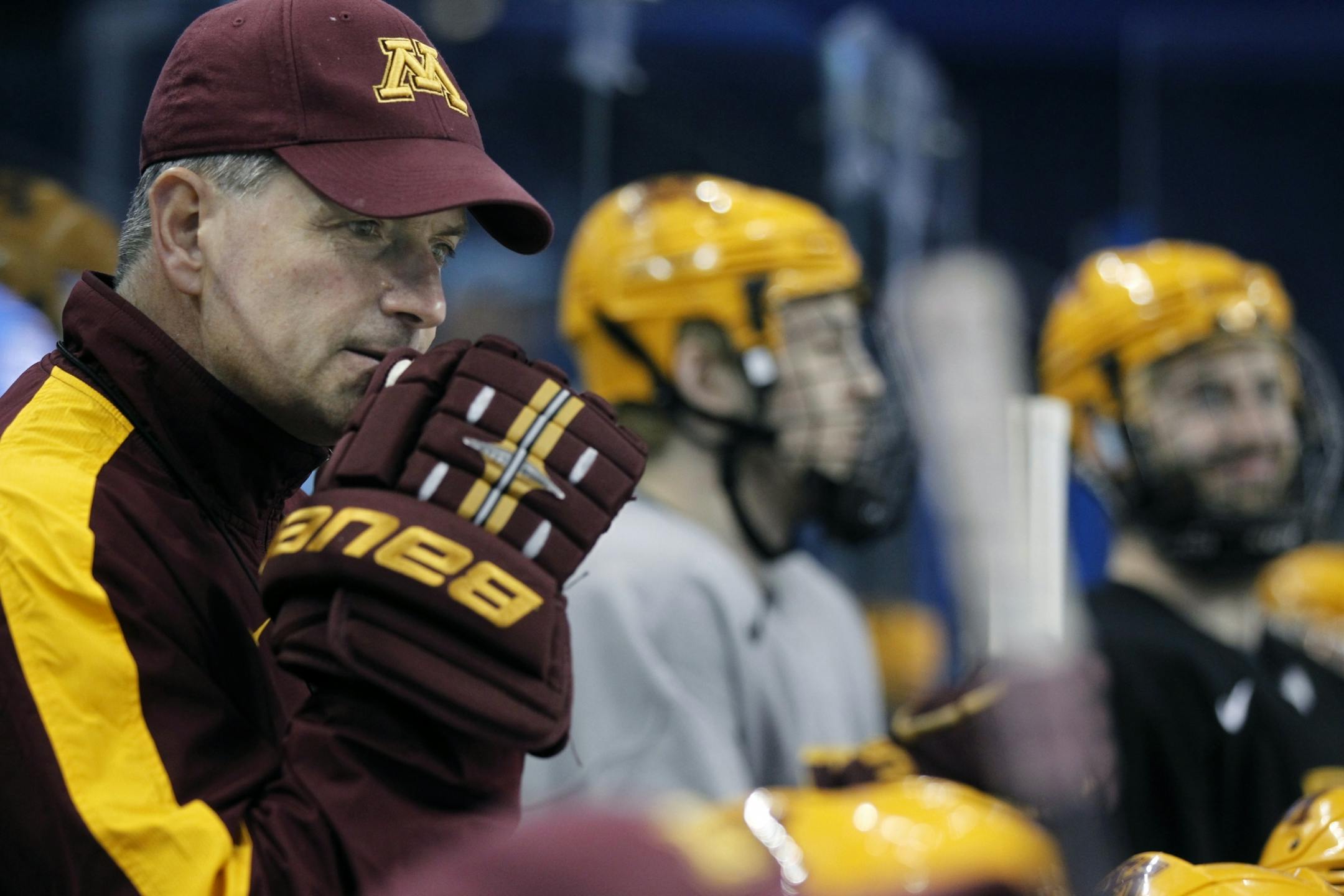 At the Tampa Bay Times Forum, the Gophers men hockey team head coach Don Lucia stood on the bench moments after the players waited to take the ice for practice. They face Boston College in the College in the semifinals tomorrow.