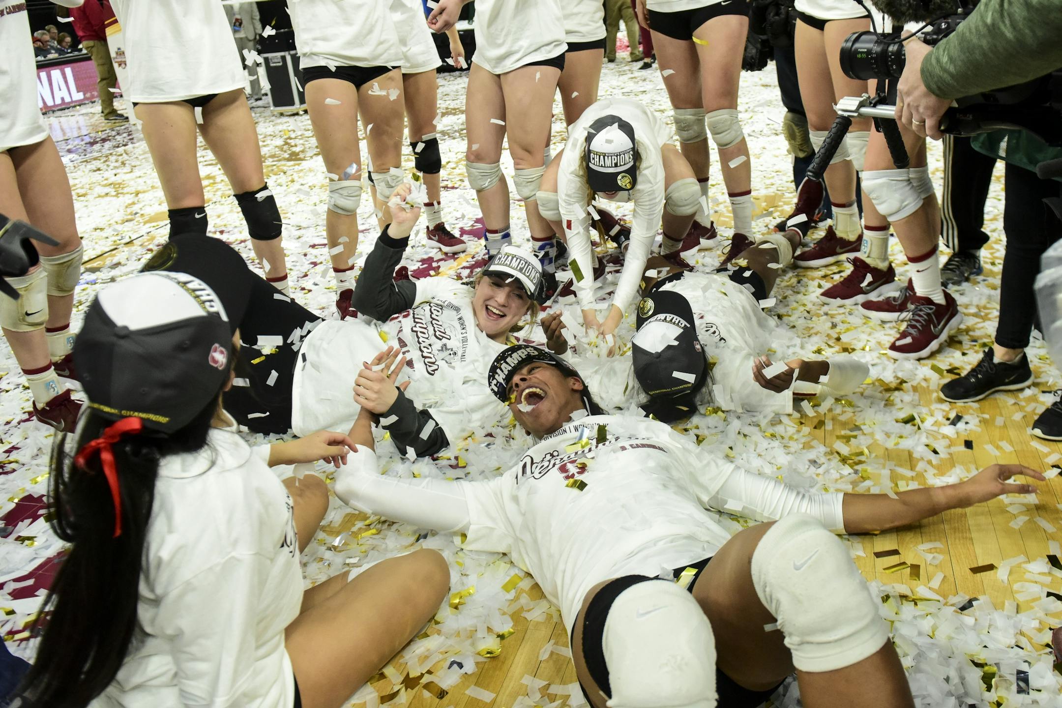 Stanford celebrated in the confetti after defeating Nebraska 3-2 in the NCAA DI volleyball championship match Saturday night.