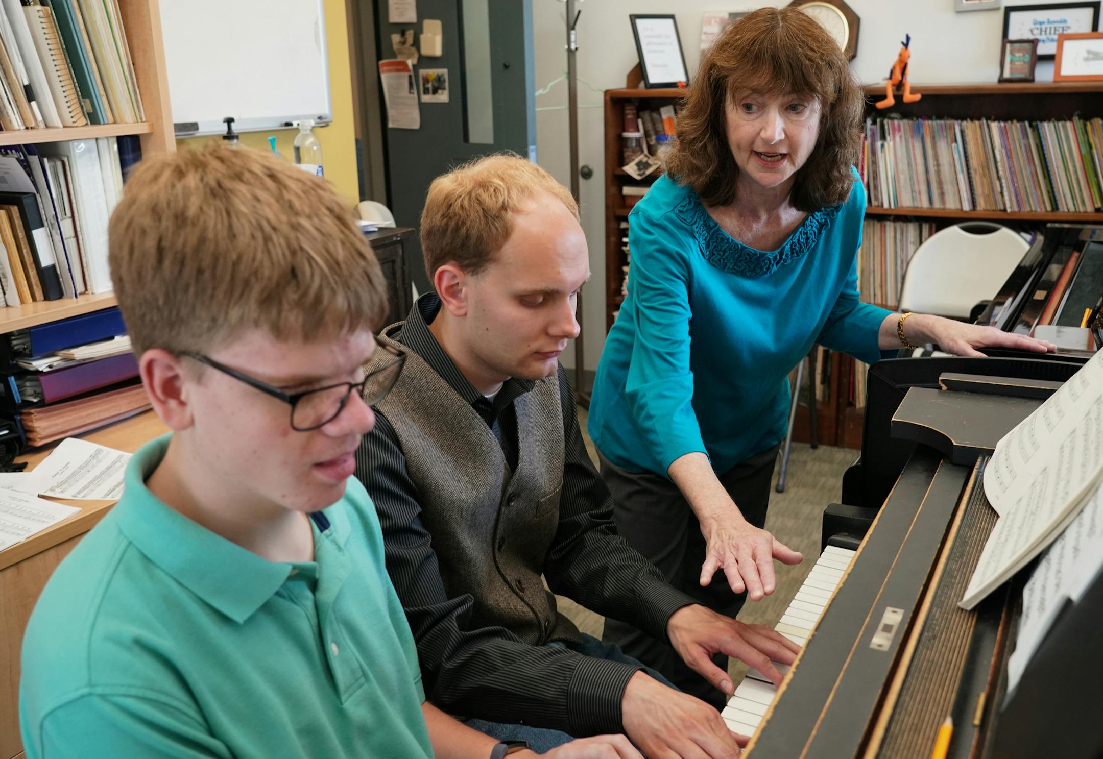 Pianists Noah Johnson (left) and Brandon Leu practiced one of their songs as teacher Diana Bearmon watched and listened. ] Shari L. Gross &#x2022; shari.gross@startribune.com Minnspiration feature for Inspired section features Noah Johnson and Brandon Leu. Noah, 17, is a pianist who is blind from Isles, Minnesota who takes lessons via Skype with the MacPhail Online program. He's also made a new friend and duet partner in 24-year-old Brandon Leu. Brandon is a pianist who has autism.