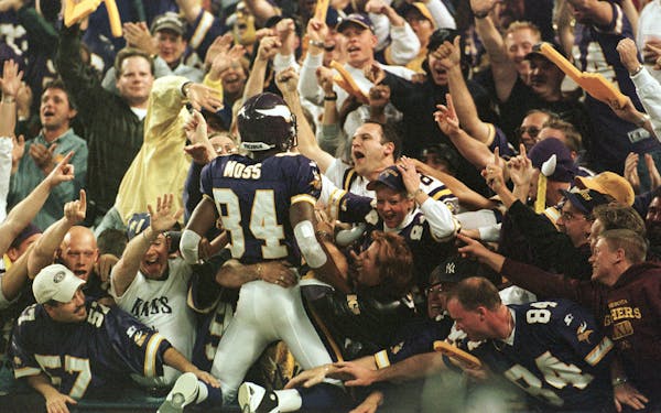 Vikings wide receiver Randy Moss found his way into the end zone and then into the Metrodome crowd after a touchdown catch against Tampa Bay in 2000. 